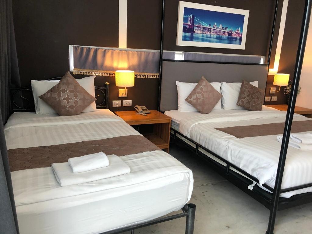 LG Lemon GrassroomsDeluxe Twin Bed With Balcony5