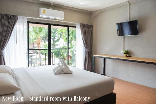 Basaya Beach Hotel ResortroomsStandard Room With Balcony Bed1
