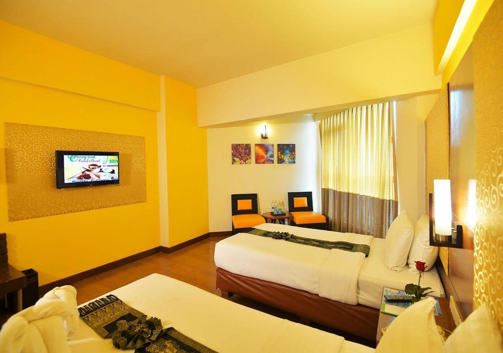 The Seasons Pattaya HotelroomsDeluxe Twin Bed Bed3