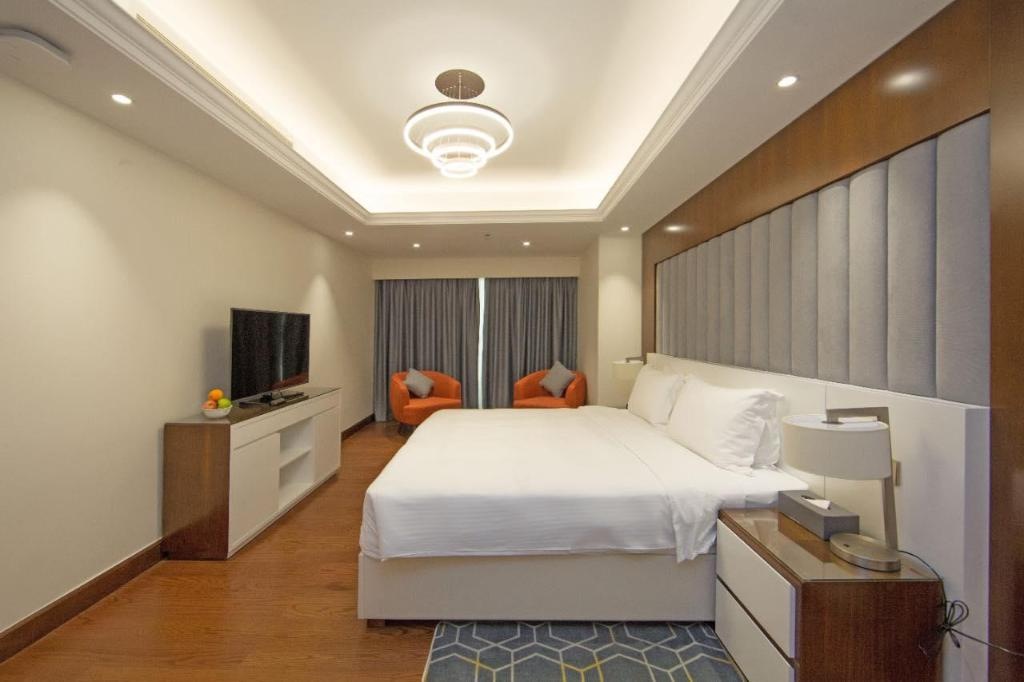 Number One Tower Suites Hotel  Rooms  4 Bedroom Bedroom 14
