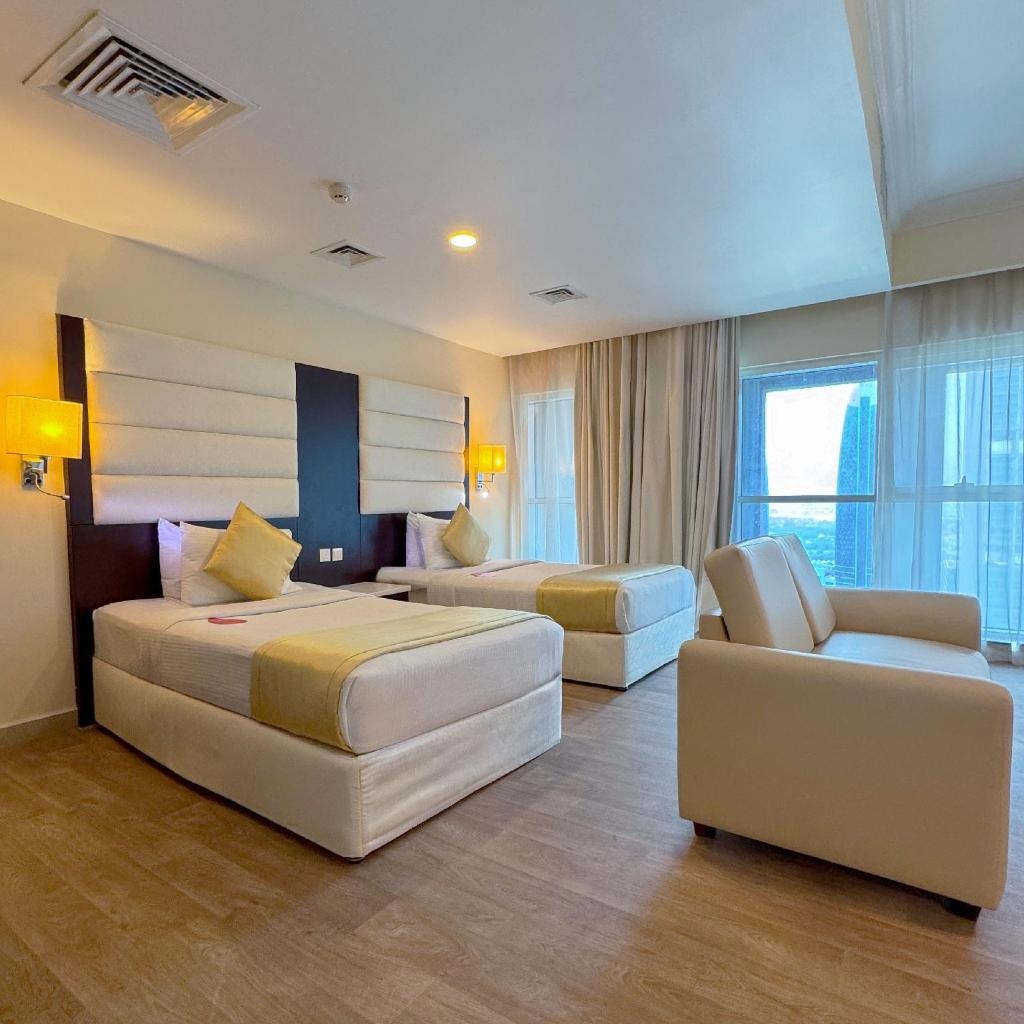 Emirates Grand Hotel  Rooms  Executive Twin Room Bed 5