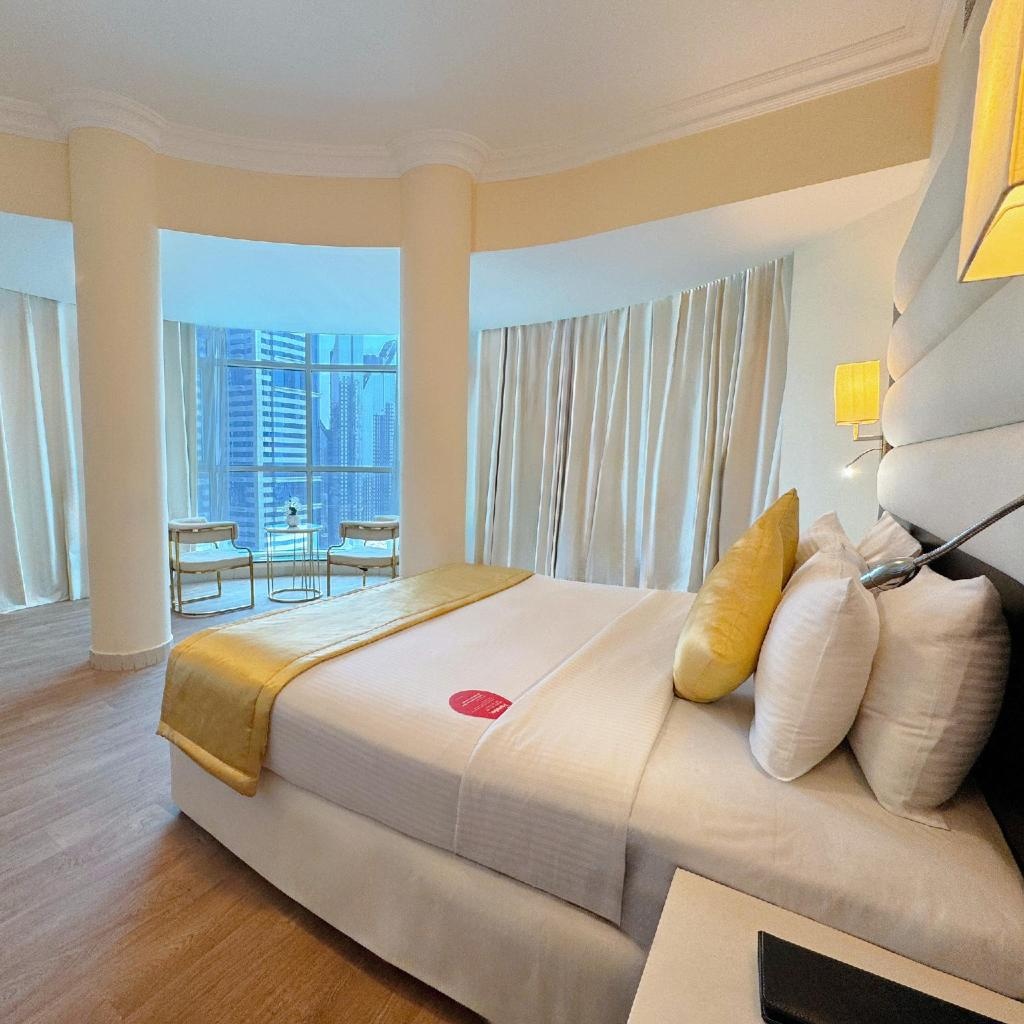 Emirates Grand Hotel  Rooms  One Bedroom Suite With Burj Khalifa View Bed 19