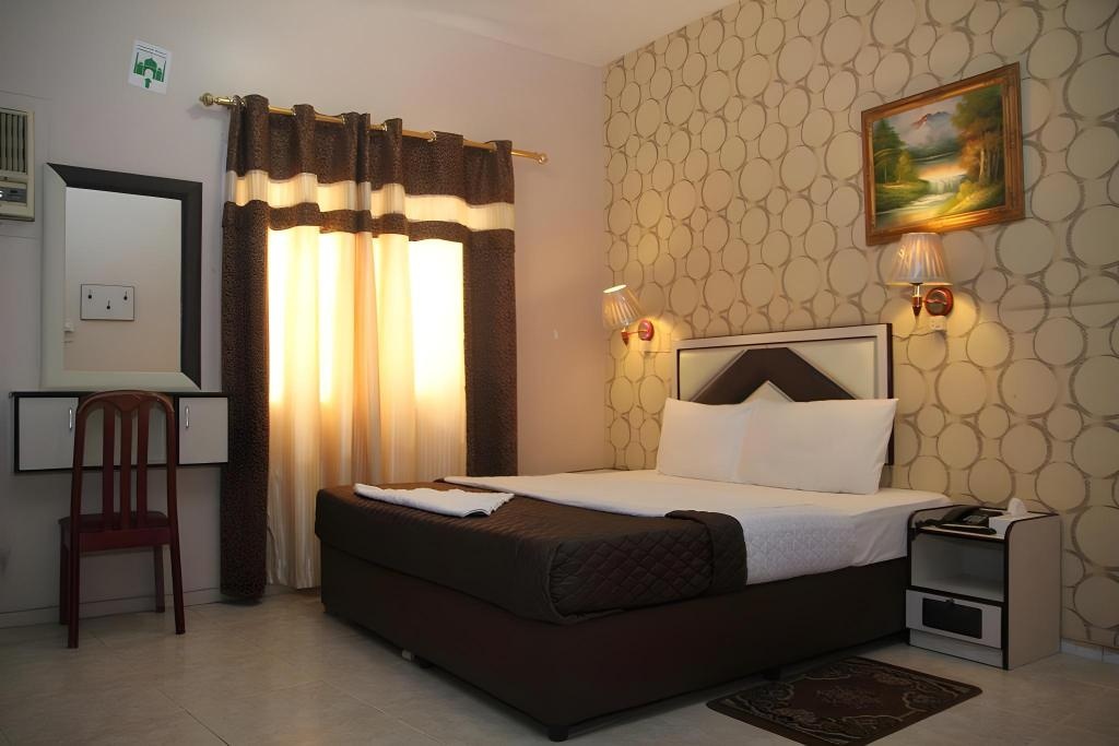 Al Kawakeb Hotel  Facilities  Bedroom 1