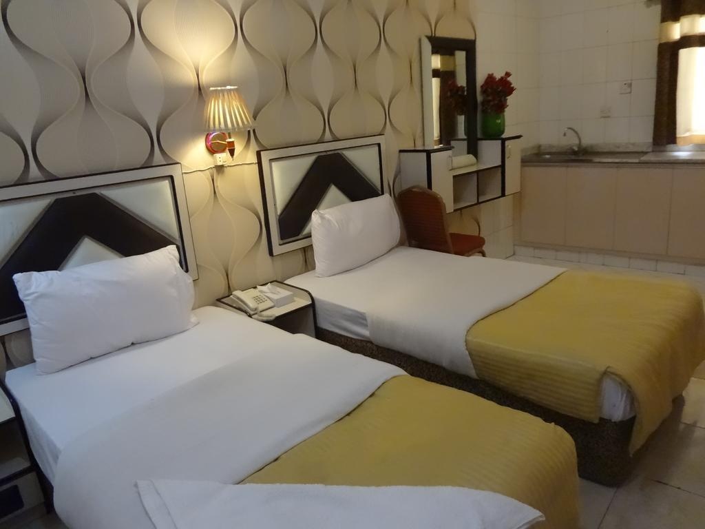 Al Kawakeb Hotel  Rooms  Double Or Twin Room Bathroom 1