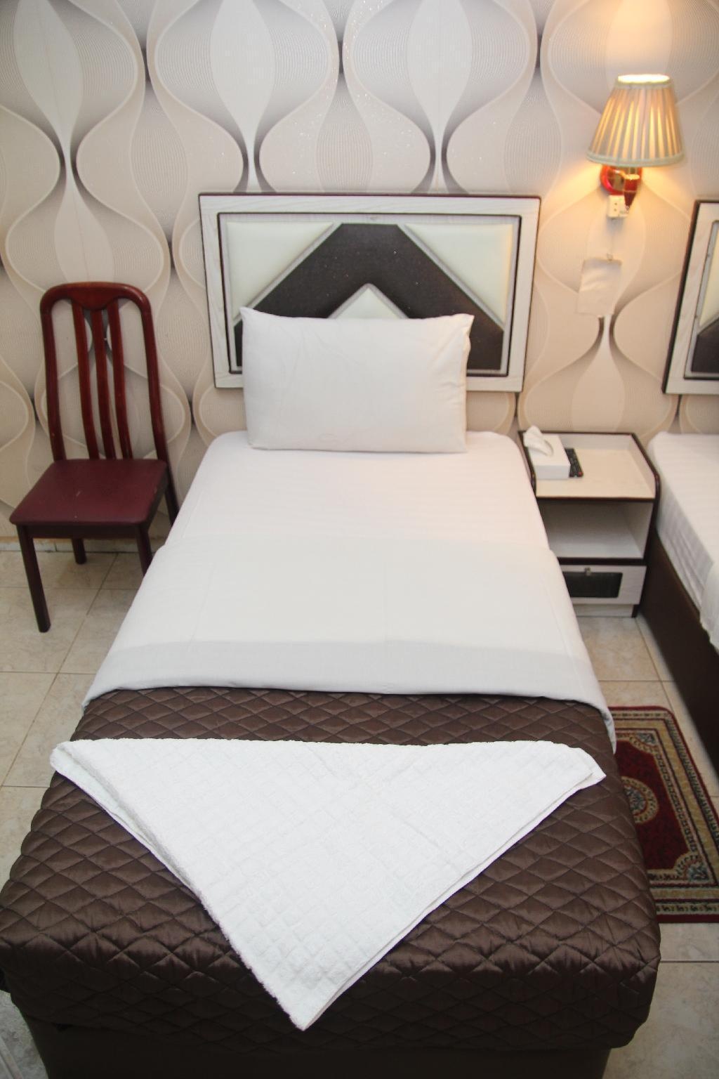 Al Kawakeb Hotel  Rooms  Single Room Bed 4