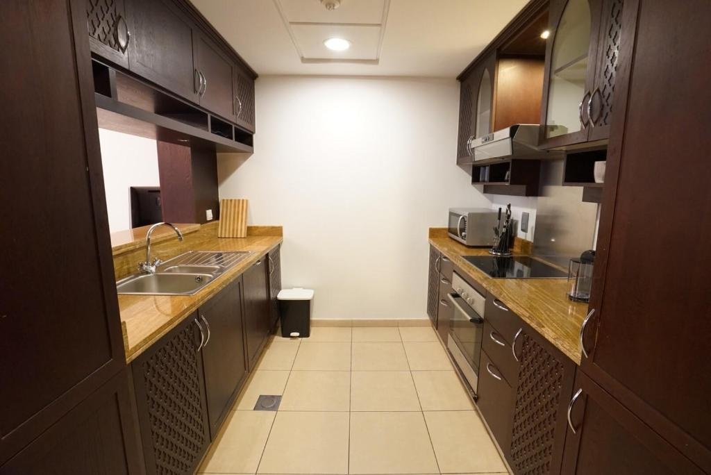 Near Dubai MallBurj KhalifaFamily Luxurious Room  Facilities  Kitchen 7