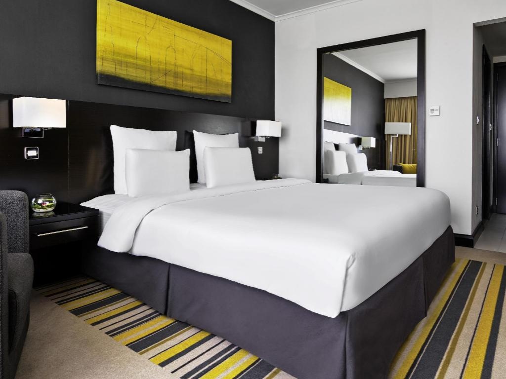 Pullman Dubai Creek City Centre  Rooms  Superior Room King Size Bed Interior View 7