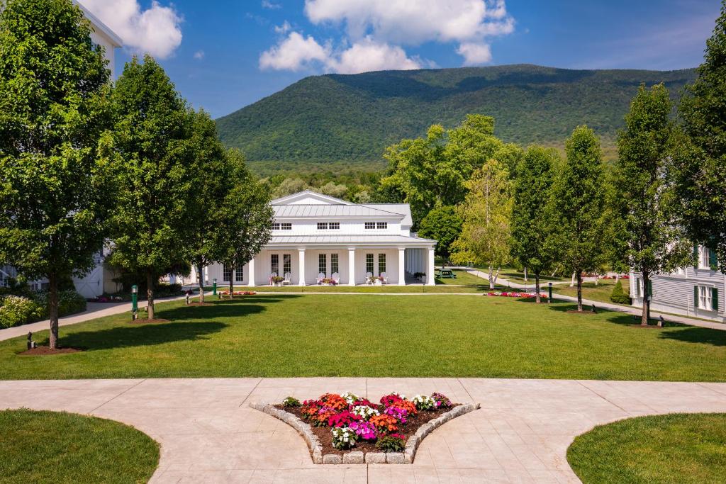 Flowers In Front Of A Large Building The Equinox Golf Resort  Spa In Manchester Vt