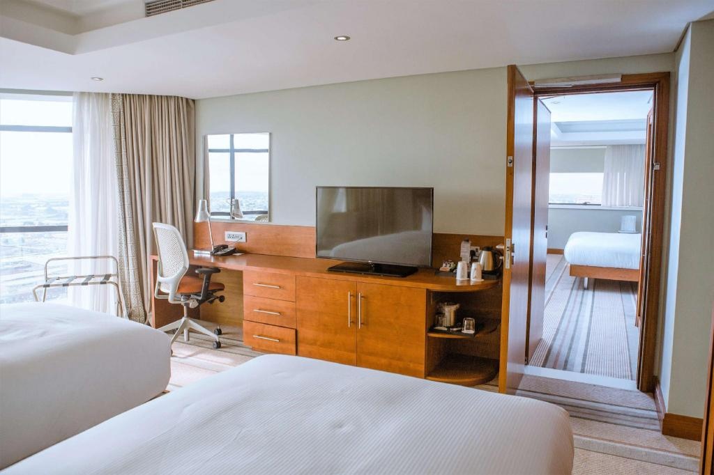 Hilton Garden Inn Lusaka Society Business Park  Rooms  Family Room Guestroom 6